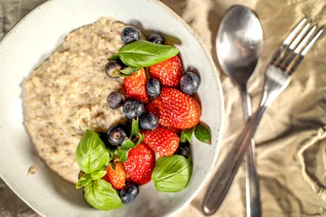 Plate of porrige with fruits